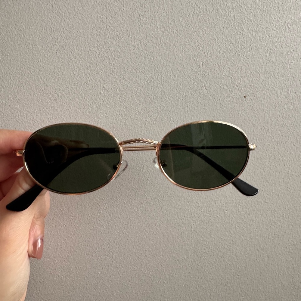 Gold Frame Oval Sunglasses with Dark Green Lenses